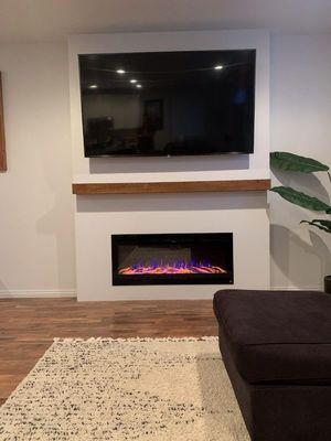 Fireplace buildout with floating mantle