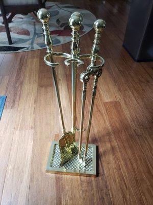 After the polishing and refinishing of my solid brass fireplace set