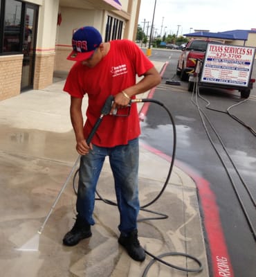 Pressure Washing a local shopping center.