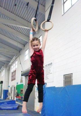 Swing on the rings into the foam pit! -- at Cameron Family YMCA.