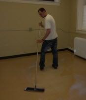 Working hard on a floor refinishing project