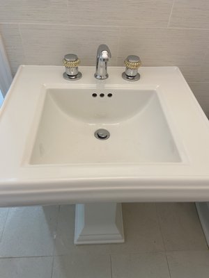 Pedestal sink and faucet