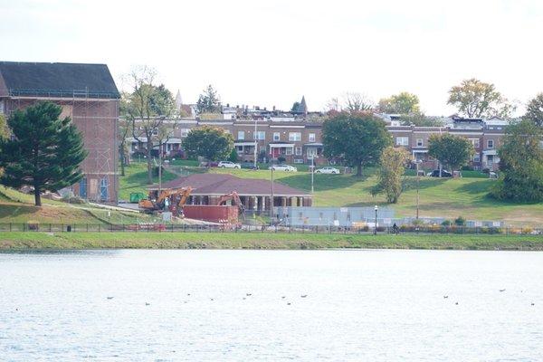 Lake and view with Adjacent Homes & School during construction.