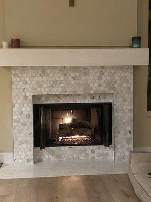 New tiled fireplace.