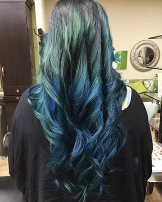 Teal and blue hair cut and colored by Taylor.