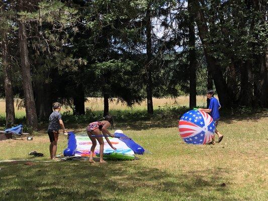 Our camping neighbors had all the fun water toys!