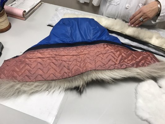 They'll sew on a ruff to any hood so that you can zip the ruff off and use it on any jacket!