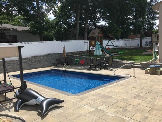 Site excavation, patio, and retaining wall build