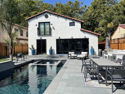 Pool remodel with Bluestone, Putting Green, and outdoor Kitchen!