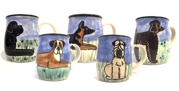 Hand painted ceramic mugs are great gifts for pet lovers. Images of dogs and cats; fully functional, microwave and dishwasher safe.