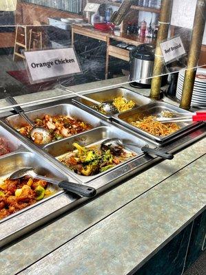 Beef & broccoli, garlic pepper chicken, shrimp fried rice and vegetarian noodles