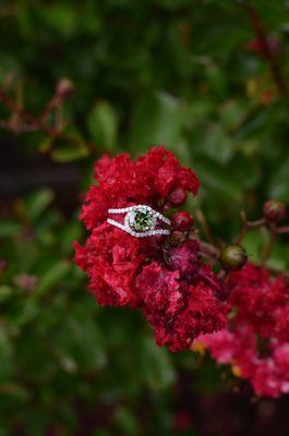 This is a beautiful green diamond set in white gold.