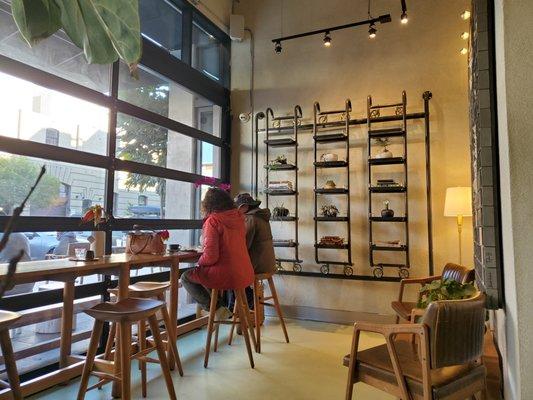 Roll up floor-to-ceiling windows create quite an open space.