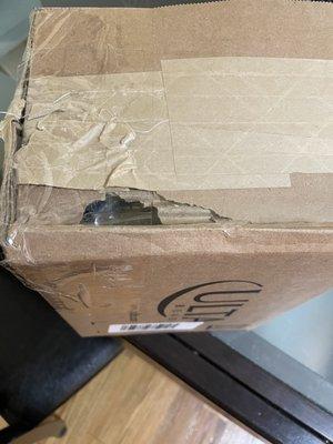 Package clearly tampered with.