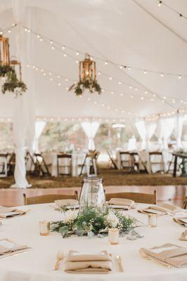 Pole tent with bistro lighting and lanterns