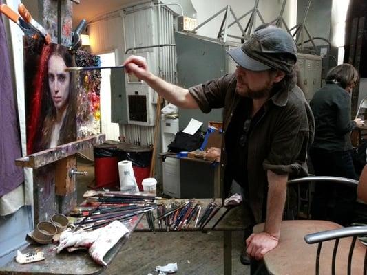 Steven Assael conducting a painting demonstration.