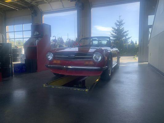 A rare international beauty came through for an oil change! A TR-6, made by England's Triumph Motor Company!