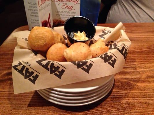 These are the appetizer rolls, served with a side of cinnamon butter. They are very good, and the cinnamon butter is great.