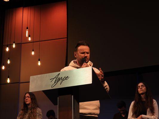 Abel Tirla, one of Agape's Youth Ministry Pastors, delivers a closing message to attendees of the Ignite Conference (2022).