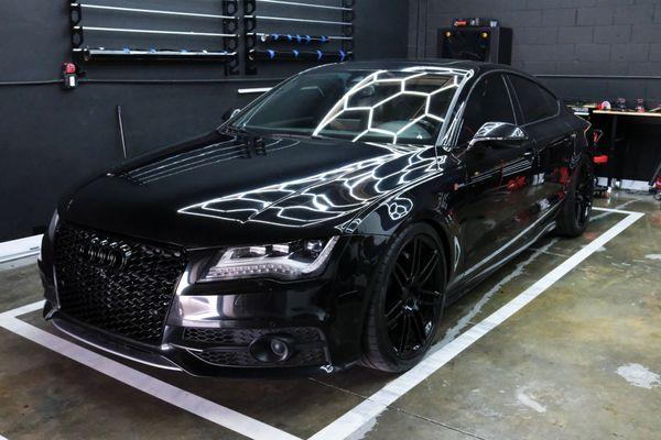 White Audi A7 fully wrapped in Hyper Gloss Black.