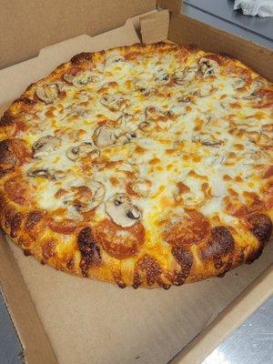 Extra cheese and pepperoni with mushrooms pizza. A great addition to any New York Style Pizza.