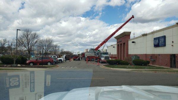 Swing area of crane or roof vacuums are flagged to protect the public from entering in our Owner designated space.