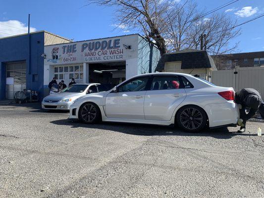 Owner and his right hand man taking care of the car themselves. Says alot about a business!