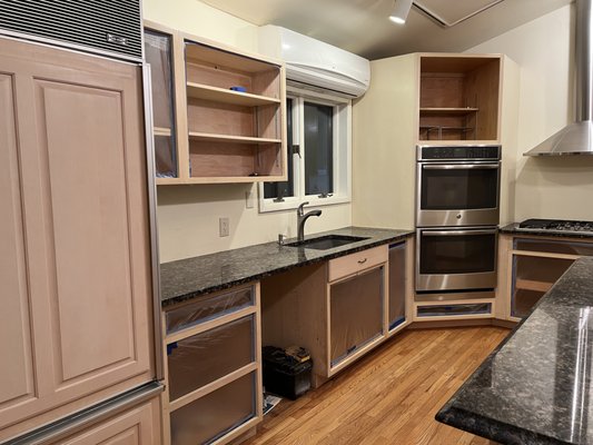 BEFORE:
 Cabinet doors being removed