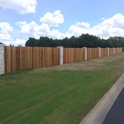 vertical fence with beautiful stone columns