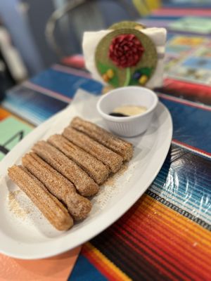 3 Churros with Chocolate and Vanilla Sauce