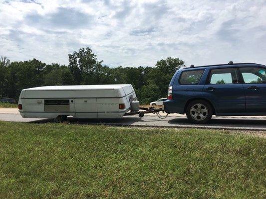 Broken axle on a small camper. Matthews towing came to the rescue.