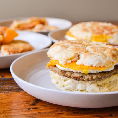 Breakfast spread. Sausage, Egg, and Cheddar; Bacon, Egg, and Cheddar; Pimento Cheese and Bacon; and Ham and Cheddar