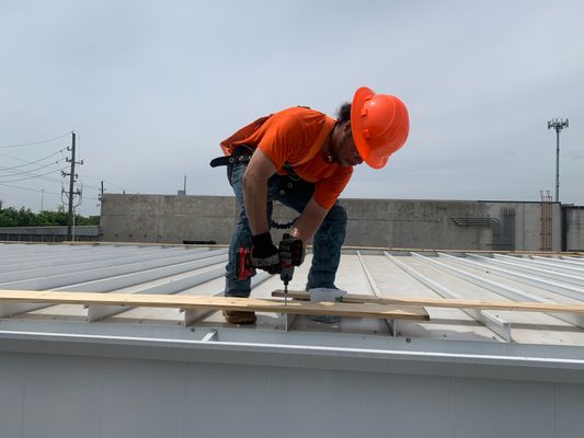 HiWire Bucket Trucks preparing to escort a PCR building