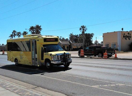 Here's a pale yellow one going up Padre Blvd. on a sunny day.  Note that you can append your bicycle to the front of it.