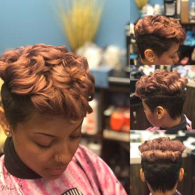 Faux hawk haircut with some rose gold color