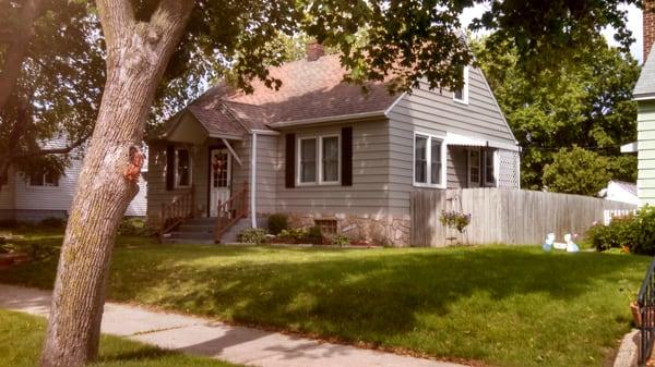 1 1/2 Story Prep and Paint Steel Siding