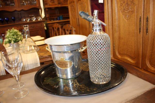 Vintage Champagne bucket and soda bottle. Great décor.