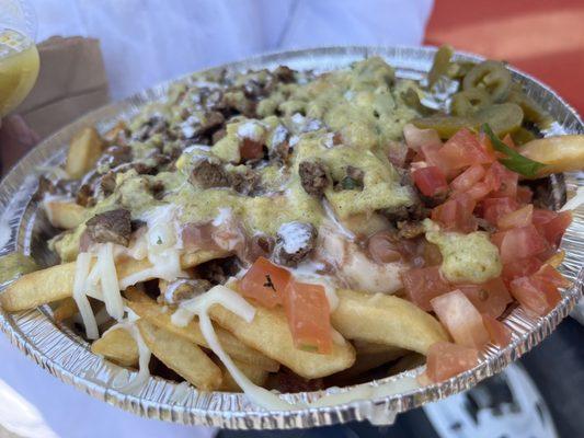 Carne Asada Fries (these were one of the employees. I just had to take a picture of it. He said they're amazing. Trying this next!)