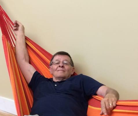 Old Bert taking a Break in the Break Room of MediaTwo ( We Installed this Brazilian Hammock For Them)