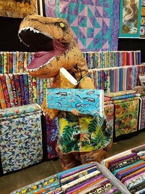 The T-Rex is excited that she found fabric with Dinosaurs!