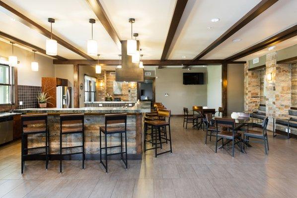 Dining area with a TV and tables for seating