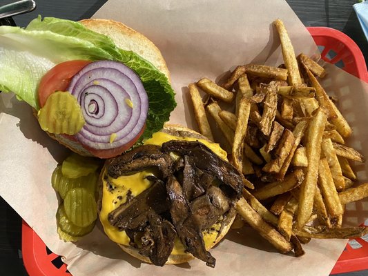 Turkey Burger on brioche bun with American cheese and roasted mushrooms.  Side of handcut fries.