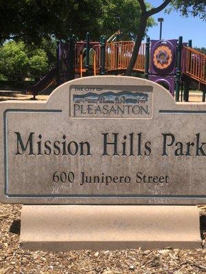 Signage, playground behind