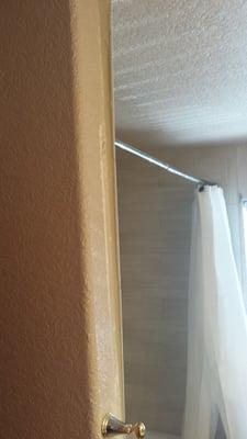 This is how they left the wall edge with the tile protruding unevenly