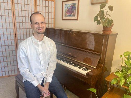 Piano teacher Sam Whitesell in the welcoming teaching studio.