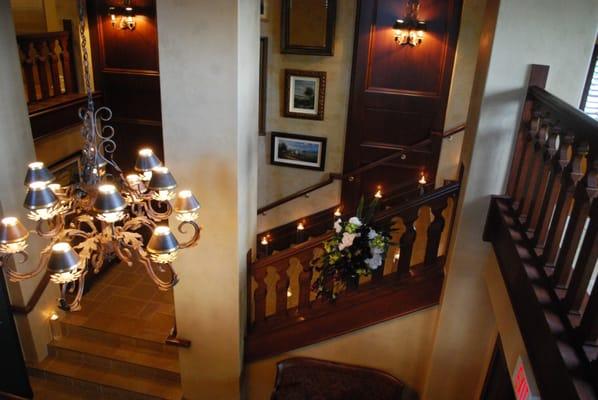 The grand staircase that goes from our front door to the upstairs banquet space.