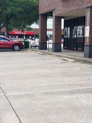 Th Is is where the disabled parking is... No ramp!  No where near the door!