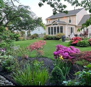 View of the rear of the house and gardens.