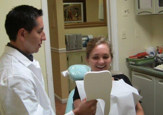 Dr. Acosta consulting with a patient.