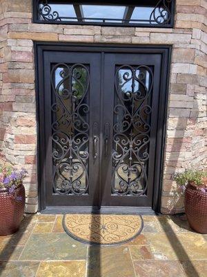 Our beautiful front doors ..repainted "antique" style by Hamlet and looks brand new again!